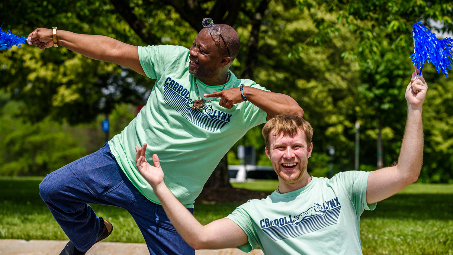 Carroll Employees Waiving Lynx Flag Carroll Community College