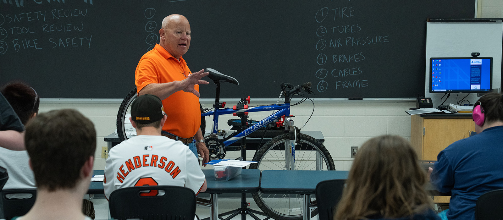 Chip Cachot classroom bike Carroll Community College