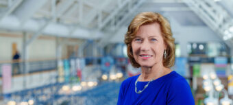 Dr. Mince standing in front of Carroll Community College