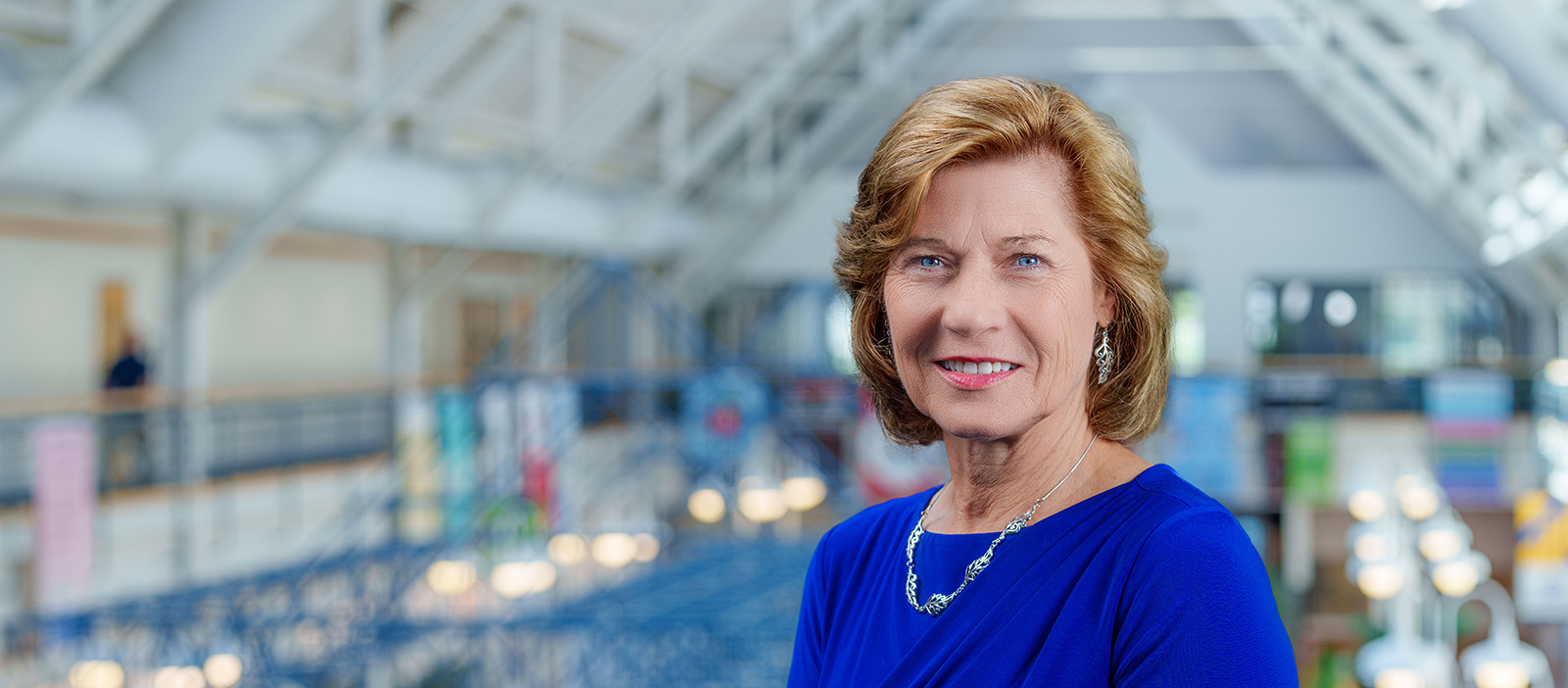 Dr. Mince standing in front of Carroll Community College