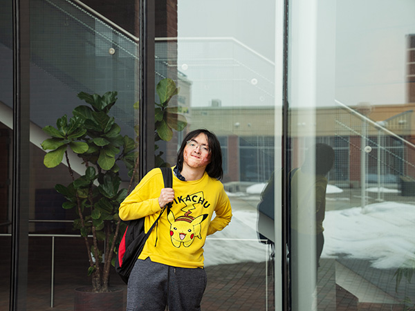 Yihan Machado Take Shape outside Building at Carroll Community College